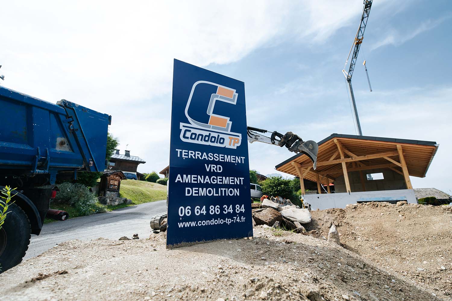 Photo d'un panneau publicitaire de la société CONDOLO TP